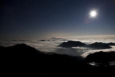 The Sun Sets Behind Foggy Hills and Expansive Rice Paddy Fields Near Chiang Mai, Thailand-Dan Holz-Photographic Print