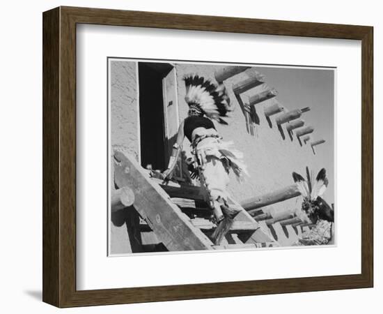 Dance San Ildefonso Pueblo New Mexico 1942 Two Indians In Headdress Ascending Stairs To House 1942-Ansel Adams-Framed Art Print