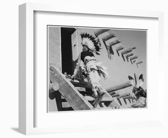 Dance San Ildefonso Pueblo New Mexico 1942 Two Indians In Headdress Ascending Stairs To House 1942-Ansel Adams-Framed Art Print