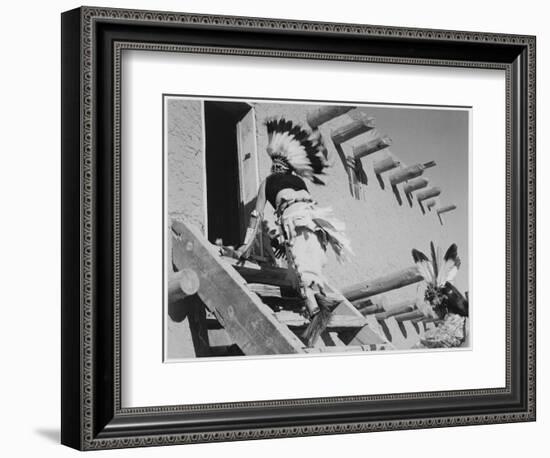 Dance San Ildefonso Pueblo New Mexico 1942 Two Indians In Headdress Ascending Stairs To House 1942-Ansel Adams-Framed Art Print