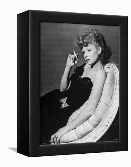 Dancer/Actress Lucille Ball in Strapless Black Lace Evening Dress, Holding Lit Cigarette on Couch-John Florea-Framed Premier Image Canvas