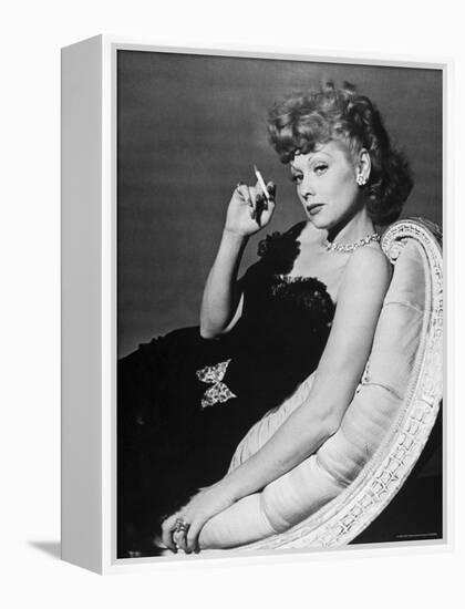 Dancer/Actress Lucille Ball in Strapless Black Lace Evening Dress, Holding Lit Cigarette on Couch-John Florea-Framed Premier Image Canvas