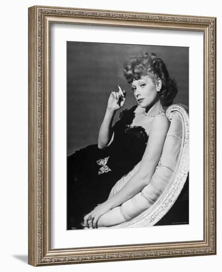 Dancer/Actress Lucille Ball in Strapless Black Lace Evening Dress, Holding Lit Cigarette on Couch-John Florea-Framed Premium Photographic Print