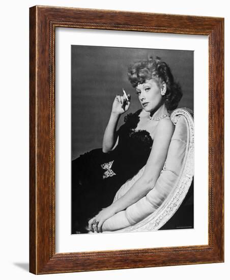 Dancer/Actress Lucille Ball in Strapless Black Lace Evening Dress, Holding Lit Cigarette on Couch-John Florea-Framed Premium Photographic Print