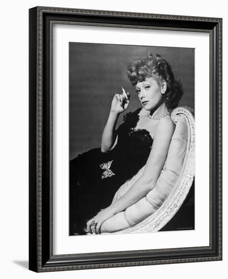 Dancer/Actress Lucille Ball in Strapless Black Lace Evening Dress, Holding Lit Cigarette on Couch-John Florea-Framed Premium Photographic Print