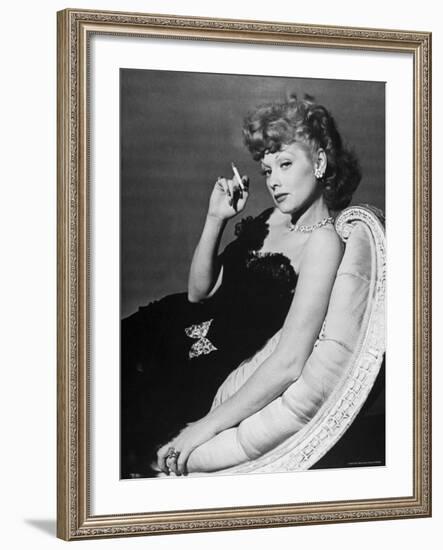 Dancer/Actress Lucille Ball in Strapless Black Lace Evening Dress, Holding Lit Cigarette on Couch-John Florea-Framed Premium Photographic Print