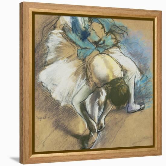 Dancer Adjusting Her Shoes, about 1880/85-Edgar Degas-Framed Premier Image Canvas