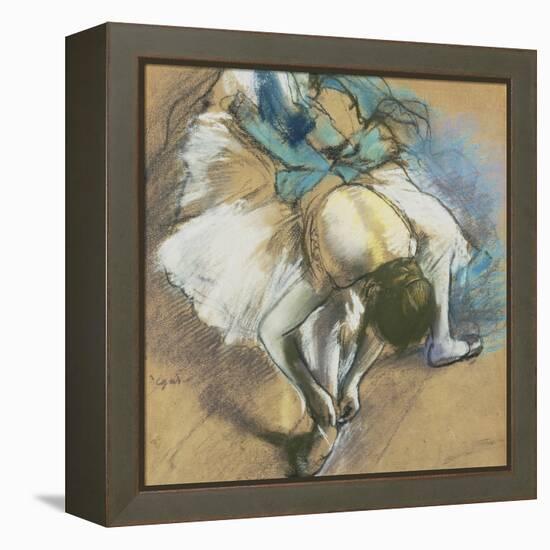 Dancer Adjusting Her Shoes, about 1880/85-Edgar Degas-Framed Premier Image Canvas