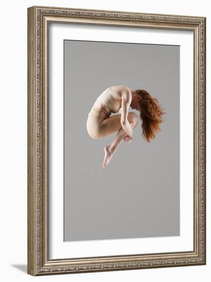 Dancer in Mid-Air with Arms around Knees-null-Framed Photo