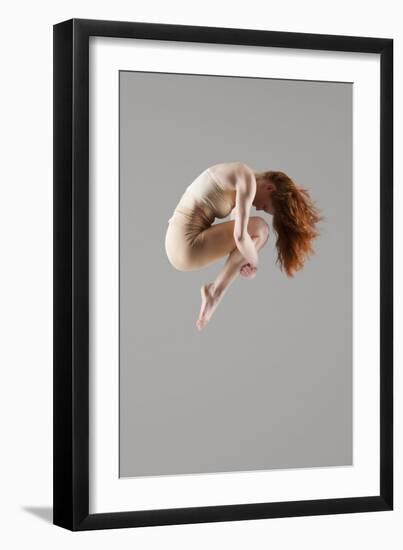 Dancer in Mid-Air with Arms around Knees-null-Framed Photo