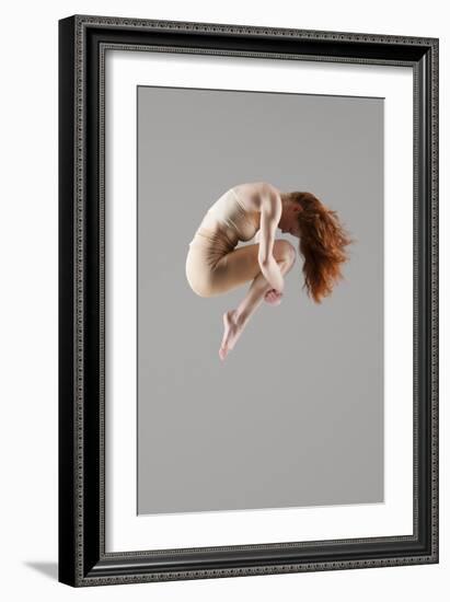 Dancer in Mid-Air with Arms around Knees-null-Framed Photo