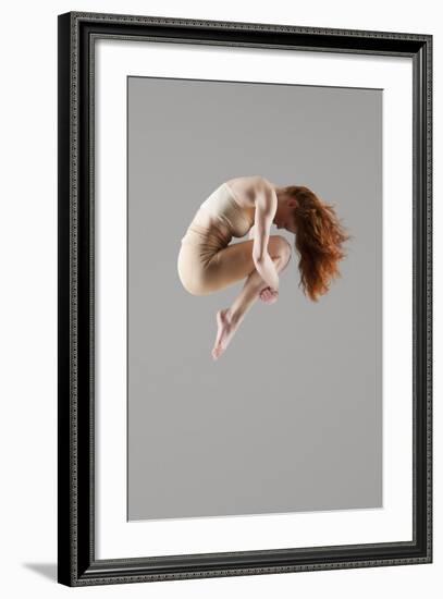 Dancer in Mid-Air with Arms around Knees-null-Framed Photo