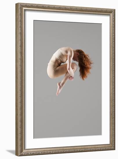 Dancer in Mid-Air with Arms around Knees-null-Framed Photo