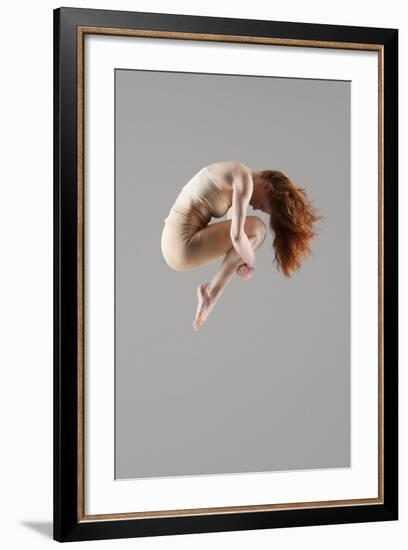 Dancer in Mid-Air with Arms around Knees-null-Framed Photo