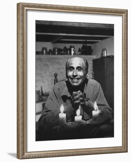 Dancer Jose Limon Seated at Candle Lit Table at His Home-Gjon Mili-Framed Premium Photographic Print