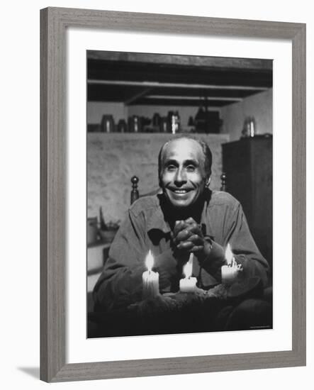 Dancer Jose Limon Seated at Candle Lit Table at His Home-Gjon Mili-Framed Premium Photographic Print