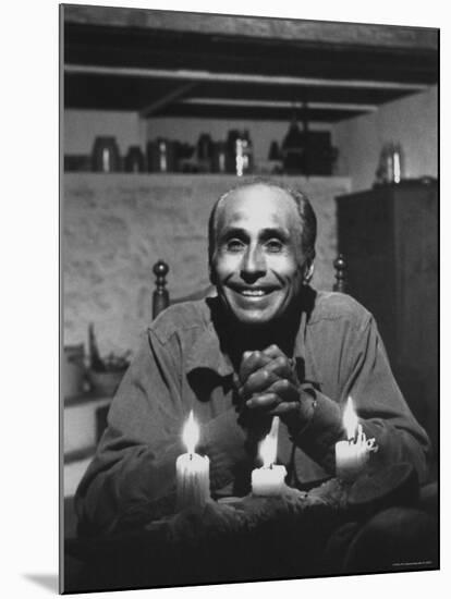 Dancer Jose Limon Seated at Candle Lit Table at His Home-Gjon Mili-Mounted Premium Photographic Print