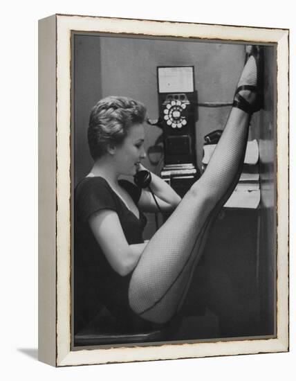 Dancer Mary Ellen Terry Talking with Her Legs Up in Telephone Booth-Gordon Parks-Framed Premier Image Canvas