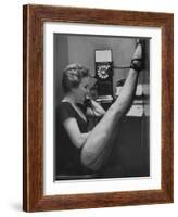 Dancer Mary Ellen Terry Talking with Her Legs Up in Telephone Booth-Gordon Parks-Framed Photographic Print