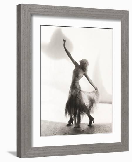 Dancer with Arms Outstretched Against White Background-null-Framed Photo