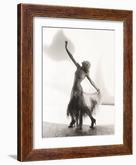 Dancer with Arms Outstretched Against White Background-null-Framed Photo