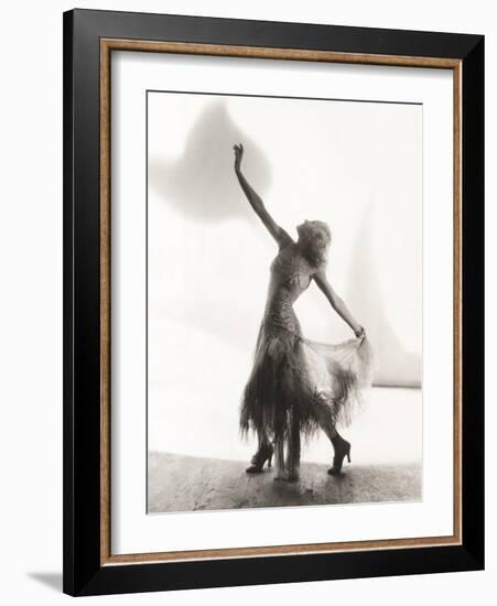 Dancer with Arms Outstretched Against White Background-null-Framed Photo