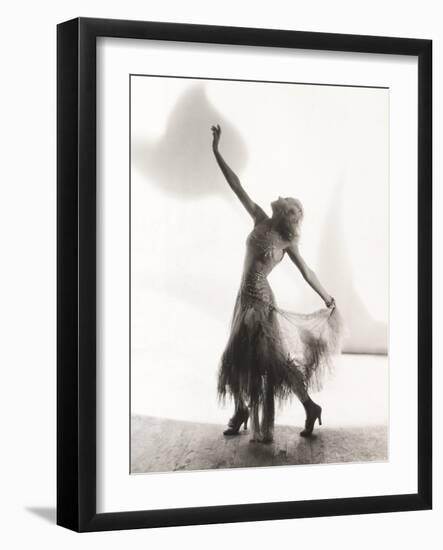 Dancer with Arms Outstretched Against White Background-null-Framed Photo