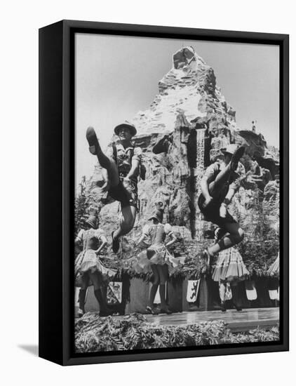 Dancers Do Matterhorn Act in Front of Artificial Slope at Disneyland-Ralph Crane-Framed Premier Image Canvas