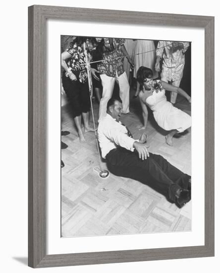 Dancing the Limbo at Party-Ralph Crane-Framed Premium Photographic Print