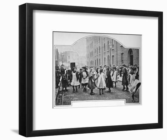 Dancing to a street organ, London, c1901 (1901)-Unknown-Framed Photographic Print