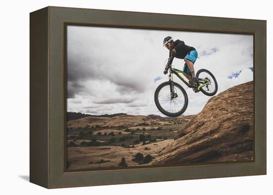 Dane Cronin Mountain Biking The Slickrock Trail In The Sand Flats Recreation Area, Moab, Utah-Louis Arevalo-Framed Premier Image Canvas