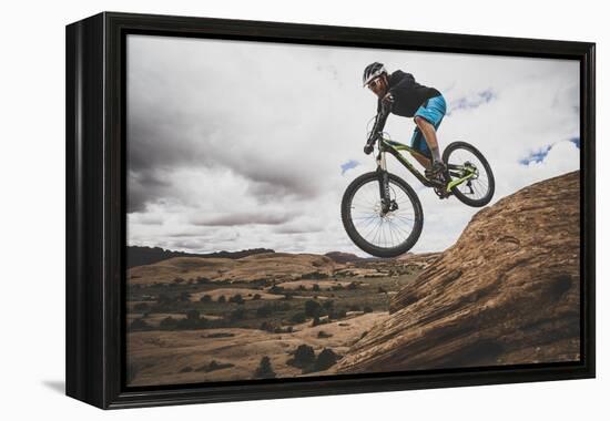 Dane Cronin Mountain Biking The Slickrock Trail In The Sand Flats Recreation Area, Moab, Utah-Louis Arevalo-Framed Premier Image Canvas