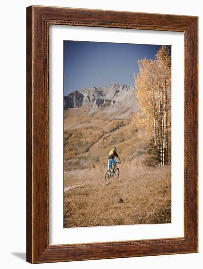 Dane Cronin Rides Through Telluride Ski Resort, San Juan Mts Loom On Horizon. Telluride, Colorado-Dan Holz-Framed Photographic Print