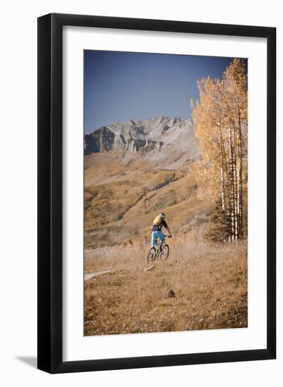 Dane Cronin Rides Through Telluride Ski Resort, San Juan Mts Loom On Horizon. Telluride, Colorado-Dan Holz-Framed Photographic Print