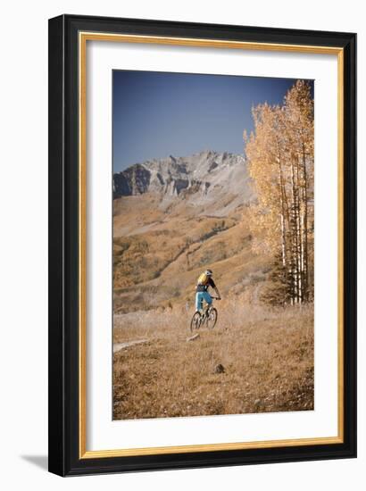 Dane Cronin Rides Through Telluride Ski Resort, San Juan Mts Loom On Horizon. Telluride, Colorado-Dan Holz-Framed Photographic Print