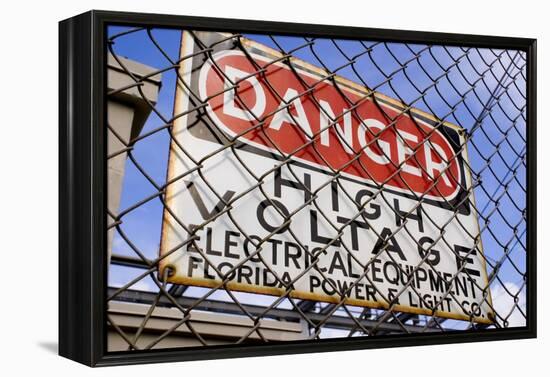 Danger High Voltage Sign In Cocoa Florida-Mark Williamson-Framed Premier Image Canvas