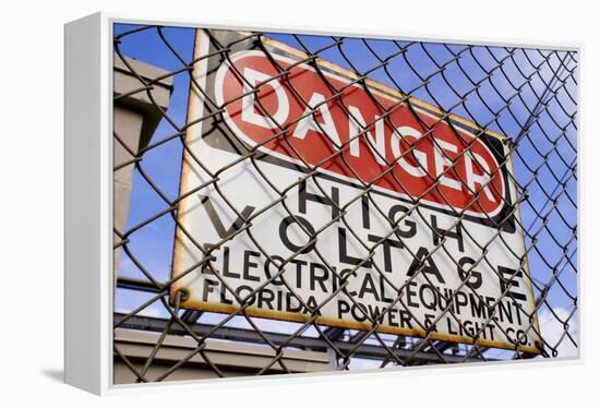 Danger High Voltage Sign In Cocoa Florida-Mark Williamson-Framed Premier Image Canvas