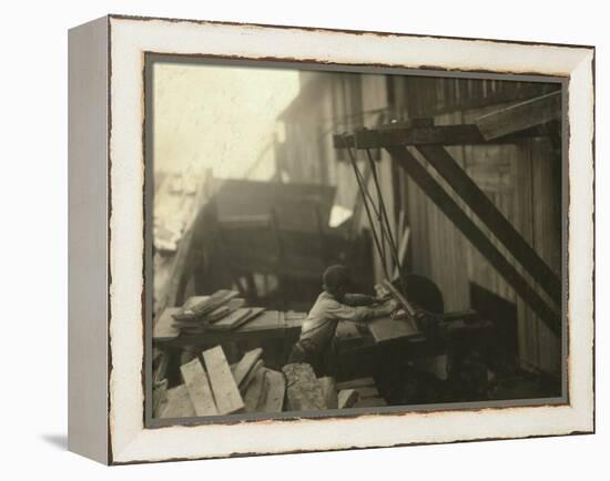 Dangerous Work - 12-Year Old Laborer at Miller and Vidor Lumber Company, Beaumont, Texas, c.1913-Lewis Wickes Hine-Framed Stretched Canvas