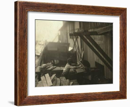 Dangerous Work - 12-Year Old Laborer at Miller and Vidor Lumber Company, Beaumont, Texas, c.1913-Lewis Wickes Hine-Framed Photo