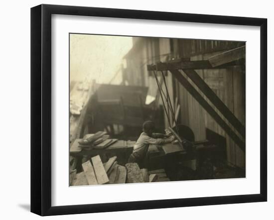 Dangerous Work - 12-Year Old Laborer at Miller and Vidor Lumber Company, Beaumont, Texas, c.1913-Lewis Wickes Hine-Framed Photo