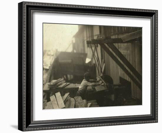 Dangerous Work - 12-Year Old Laborer at Miller and Vidor Lumber Company, Beaumont, Texas, c.1913-Lewis Wickes Hine-Framed Photo