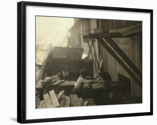 Dangerous Work - 12-Year Old Laborer at Miller and Vidor Lumber Company, Beaumont, Texas, c.1913-Lewis Wickes Hine-Framed Photo