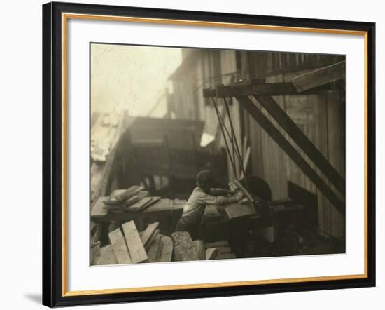 Dangerous Work - 12-Year Old Laborer at Miller and Vidor Lumber Company, Beaumont, Texas, c.1913-Lewis Wickes Hine-Framed Photo