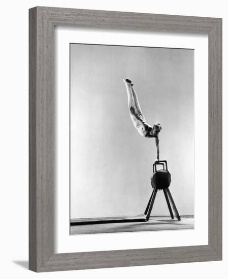 Danish Gymnastics Champion Hans Elmann Executing High Front Vault-Gjon Mili-Framed Photographic Print