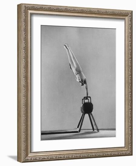 Danish Gymnastics Champion Hans Elmann Executing High Front Vault-Gjon Mili-Framed Photographic Print