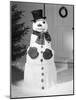 Dapper Snowman Outside a House-Bettmann-Mounted Photographic Print