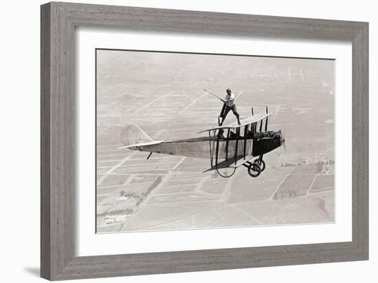 Daredevil Al Wilson Golfing on Biplane-null-Framed Photographic Print