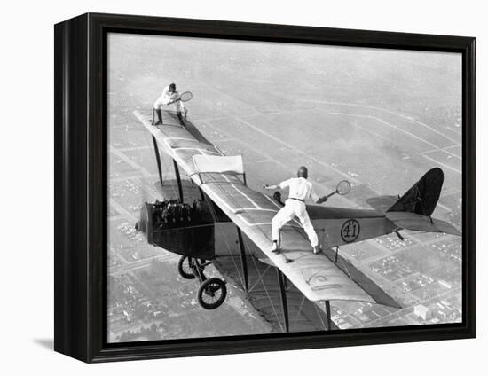 Daredevils Playing Tennis on a Biplane-null-Framed Premier Image Canvas