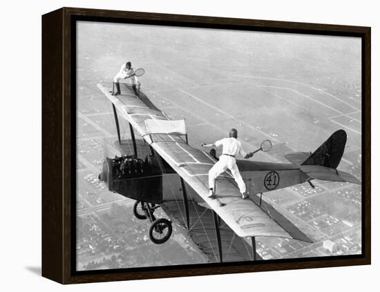 Daredevils Playing Tennis on a Biplane-null-Framed Premier Image Canvas