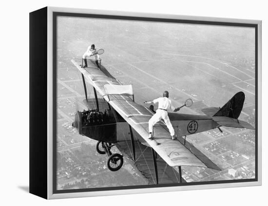 Daredevils Playing Tennis on a Biplane-null-Framed Premier Image Canvas